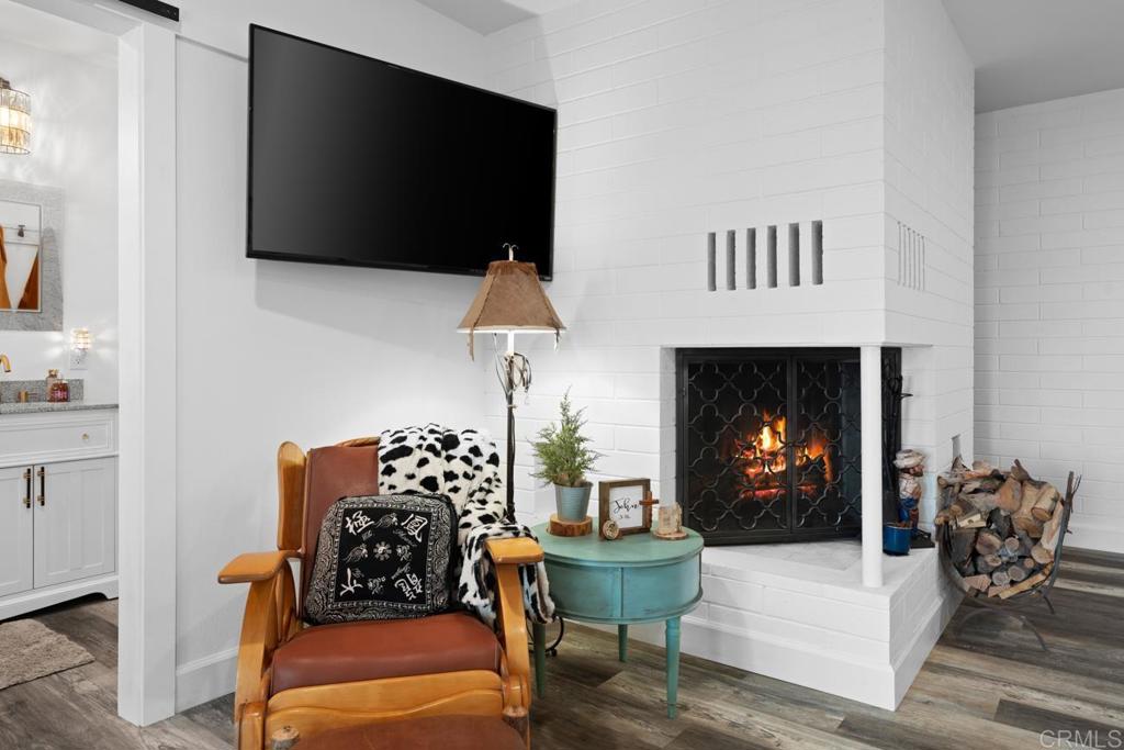 812 Sharon Way El Cajon, CA 92020 - Photo 22 of 65 a living room with furniture and a fireplace