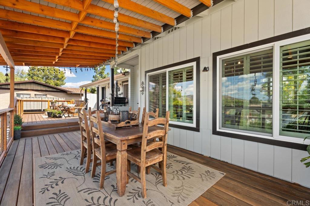 812 Sharon Way El Cajon, CA 92020 - Photo 37 of 65 a view of a patio with table and chairs
