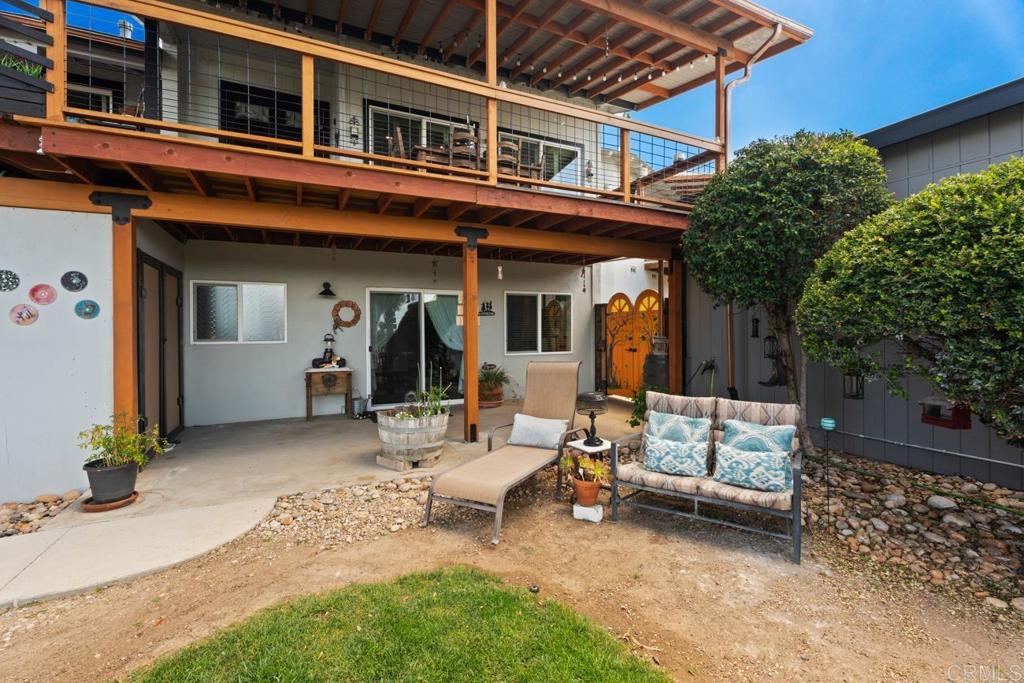 812 Sharon Way El Cajon, CA 92020 - Photo 40 of 65 a view of a house with backyard porch and sitting area