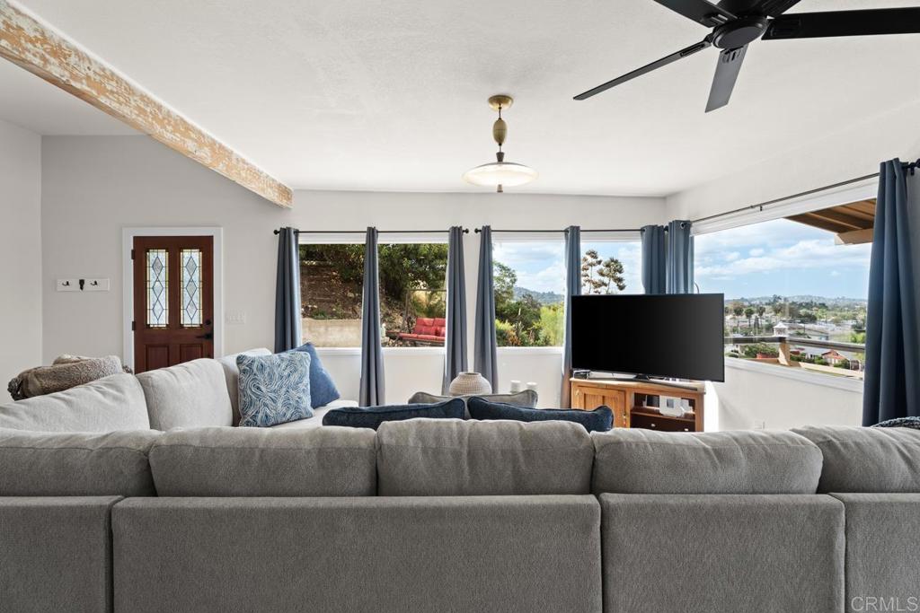 812 Sharon Way El Cajon, CA 92020 - Photo 56 of 65 a living room with furniture and a flat screen tv