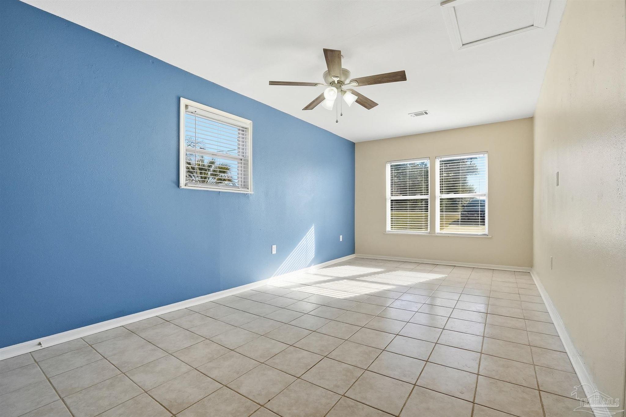 5590 Cyanamid Road Milton, FL 32583 - Photo 14 of 44 a view of an empty room with a window