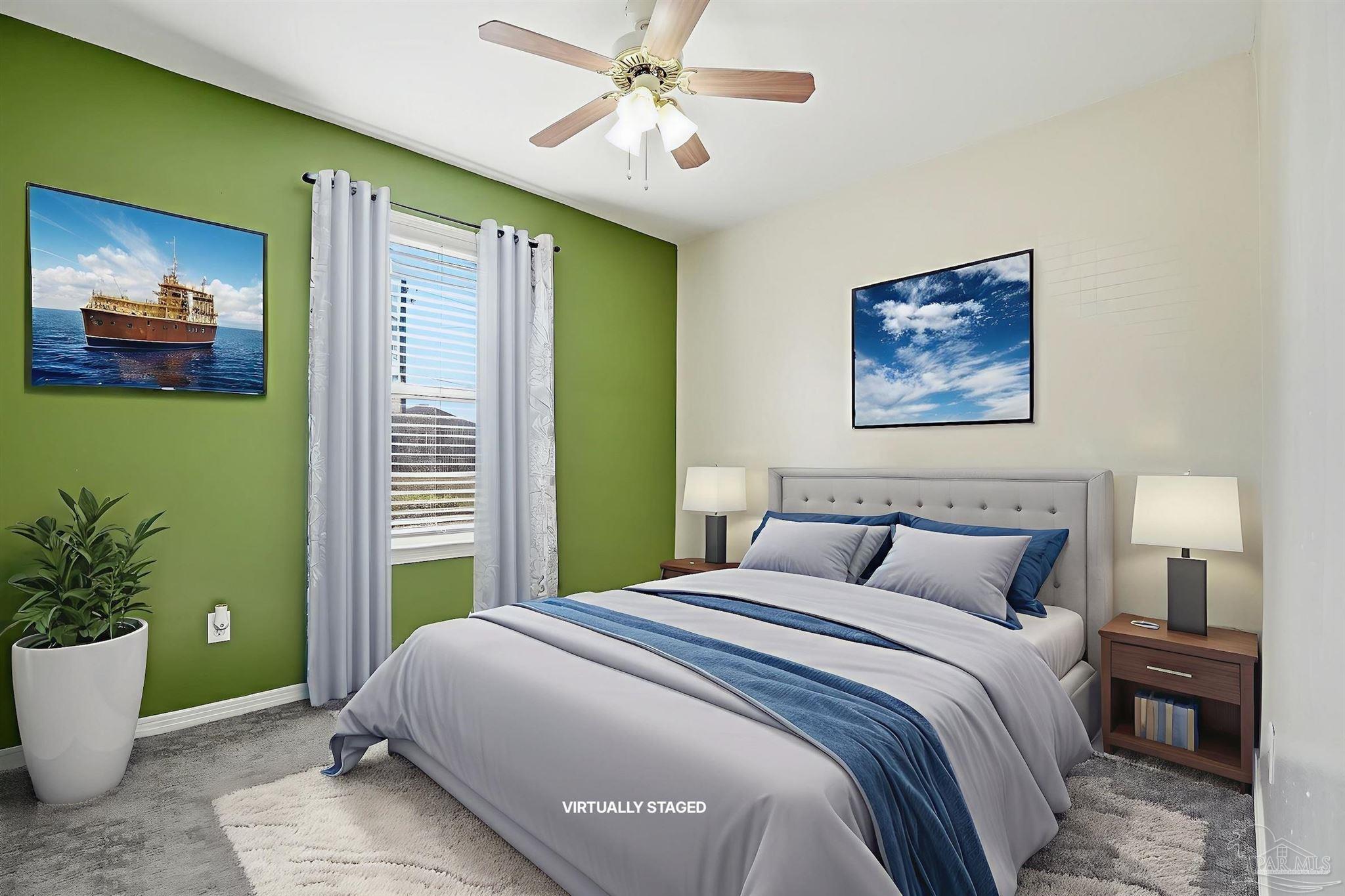 5590 Cyanamid Road Milton, FL 32583 - Photo 35 of 44 a bedroom with a large bed and a potted plant