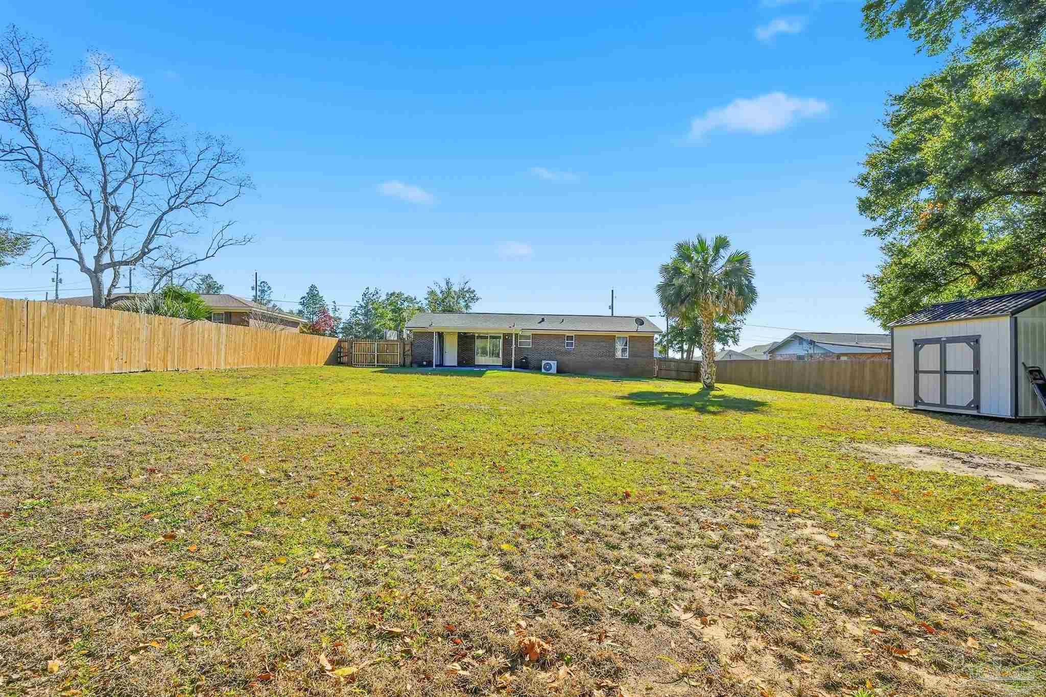 5590 Cyanamid Road Milton, FL 32583 - Photo 39 of 44 a view of an outdoor space and swimming pool