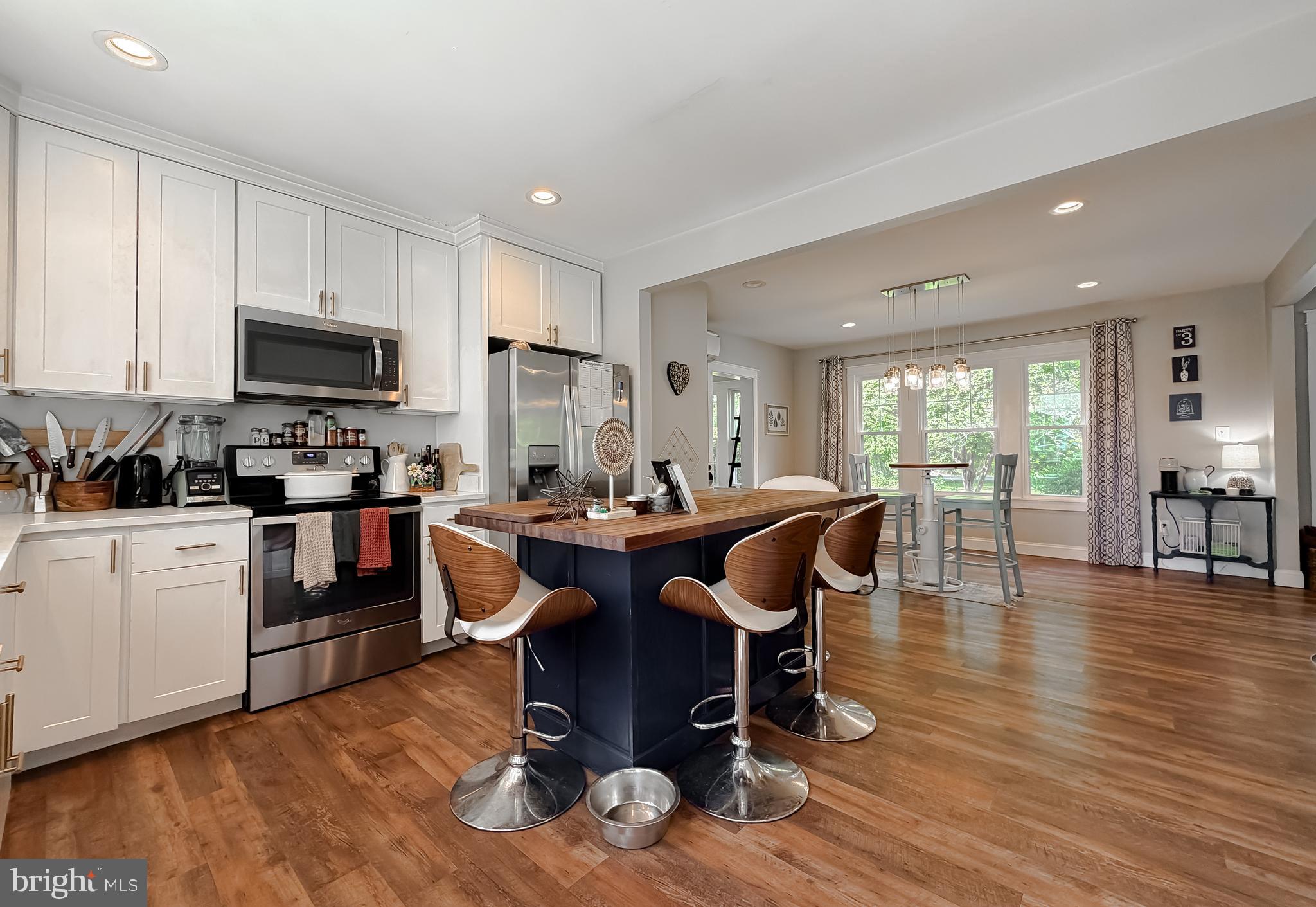 16146 Thomas Road Piney Point, MD 20674 - Photo 6 of 57 a view of kitchen with dining table and chairs
