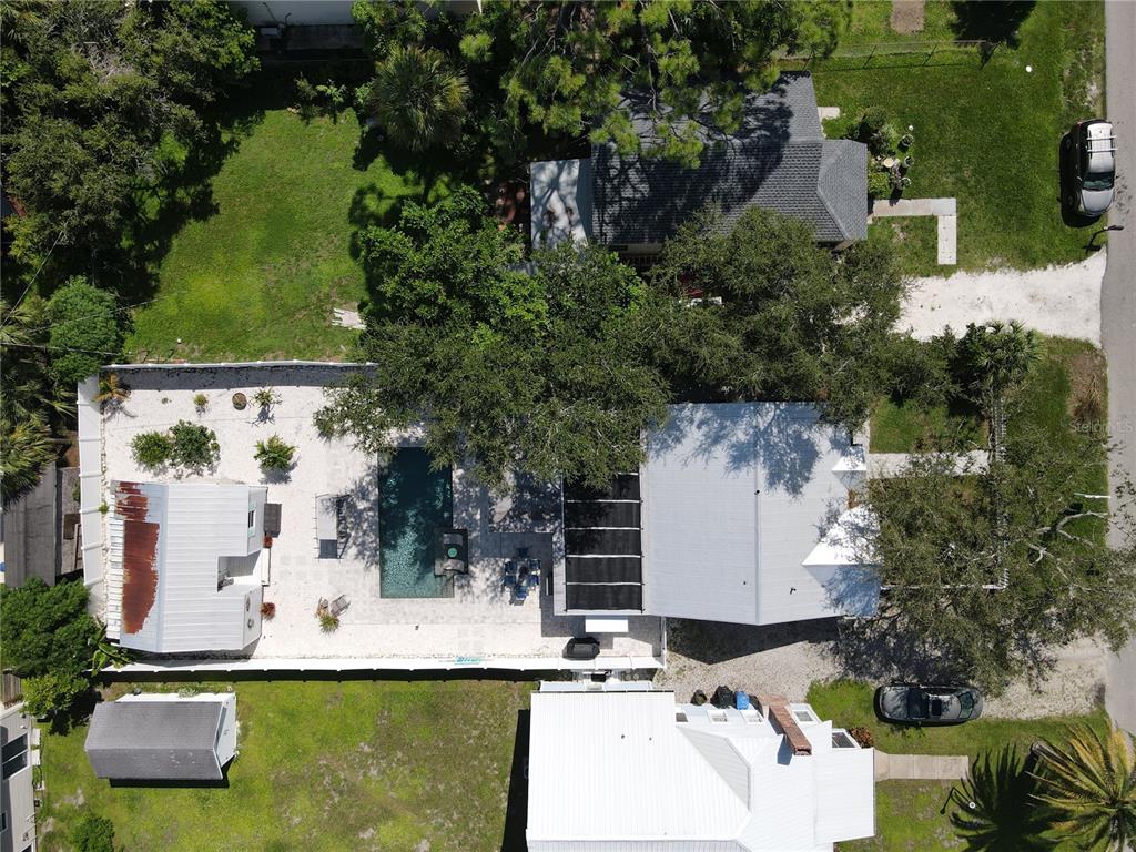 721 Myrtle Avenue Venice, FL 34285 - Photo 41 of 42 an aerial view of a house with a garden and swimming pool