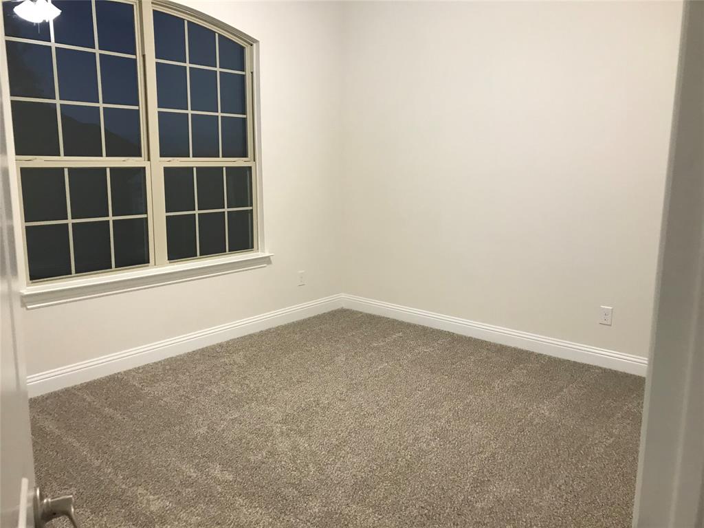 4111 Beamer Drive Forney, TX 75126 - Photo 11 of 25 a view of an empty room with a window