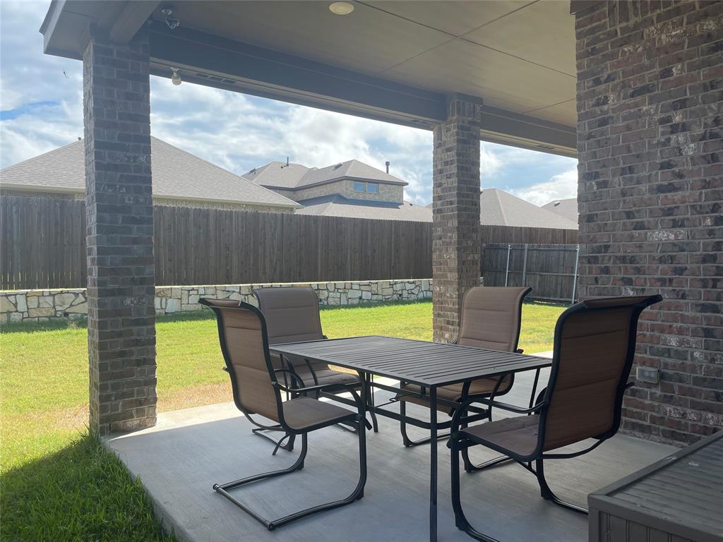 4111 Beamer Drive Forney, TX 75126 - Photo 3 of 25 a view of a chairs and table in patio