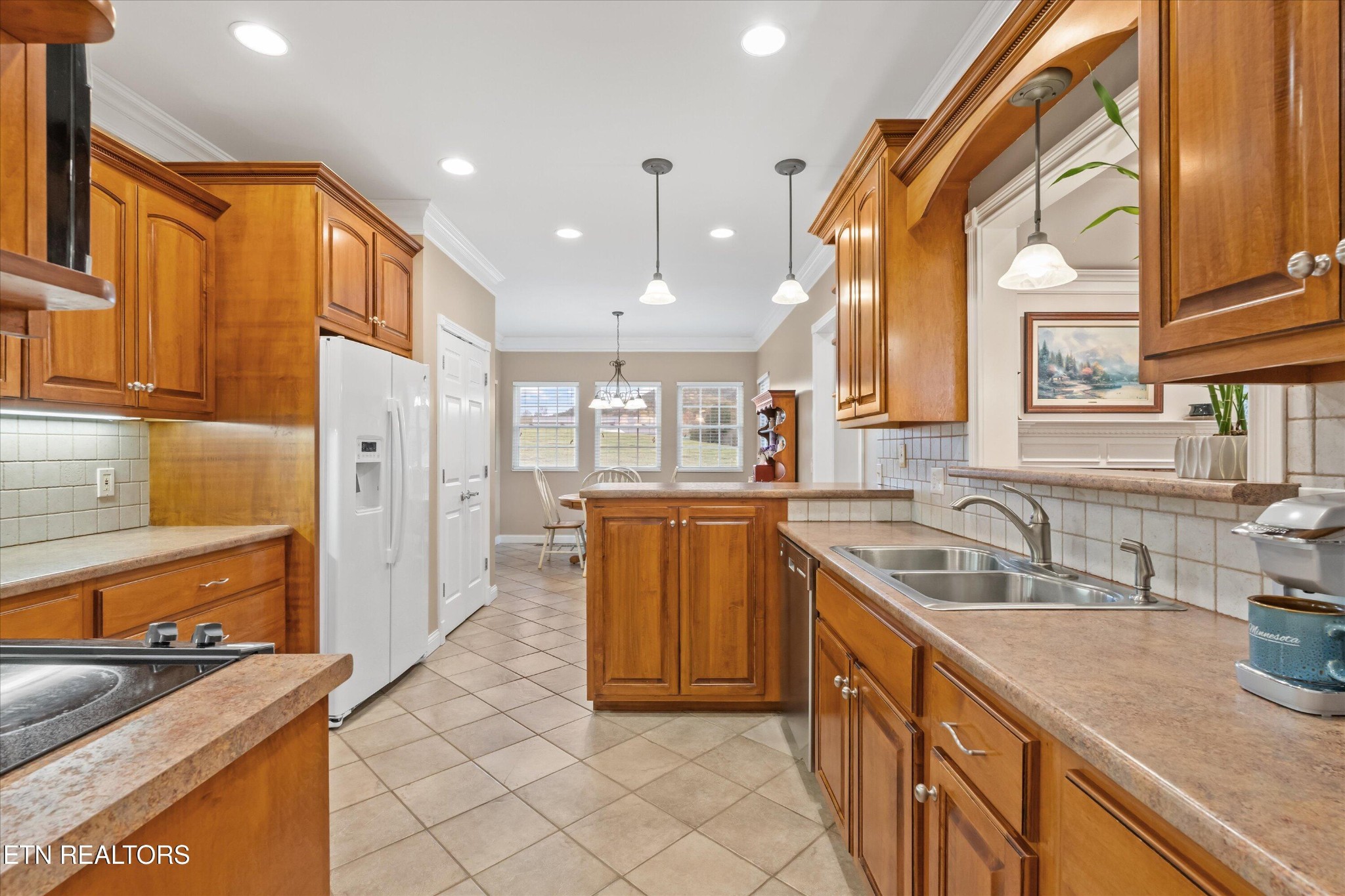 7613 Powderhorn Trail Townsend, TN 37882 - Photo 13 of 43 a kitchen with stainless steel appliances granite countertop a sink and a stove