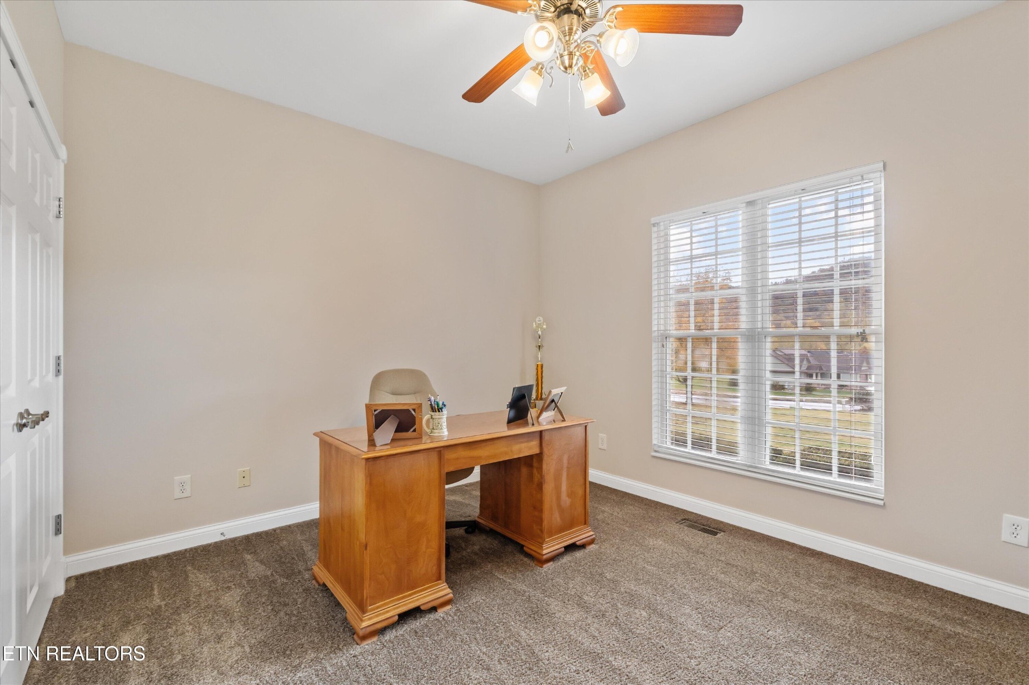 7613 Powderhorn Trail Townsend, TN 37882 - Photo 18 of 43 a view of a workspace with furniture and a window