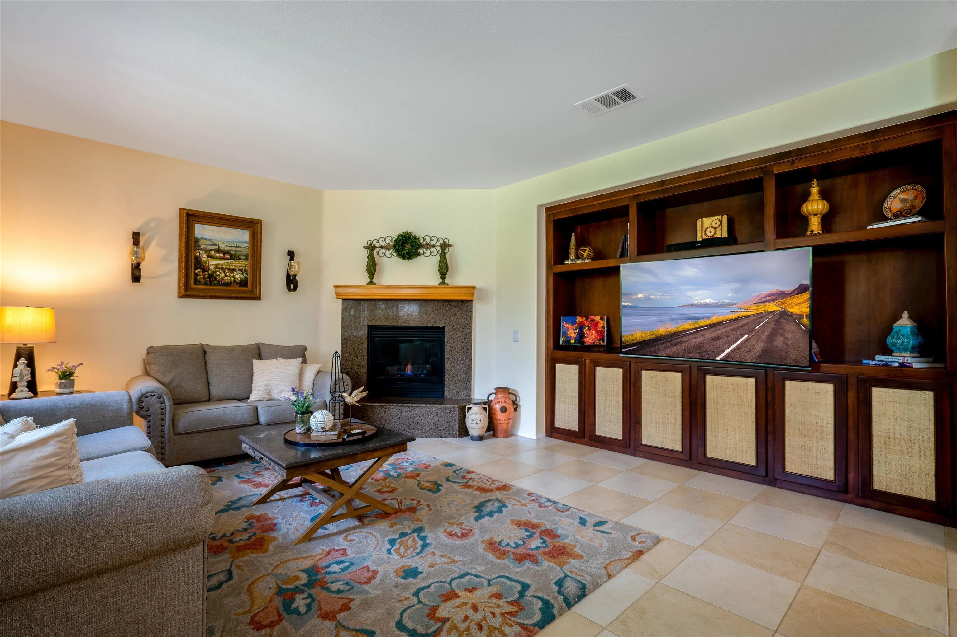 38837 Rockinghorse Road Murrieta, CA 92563 - Photo 16 of 41 a living room with furniture and a fireplace