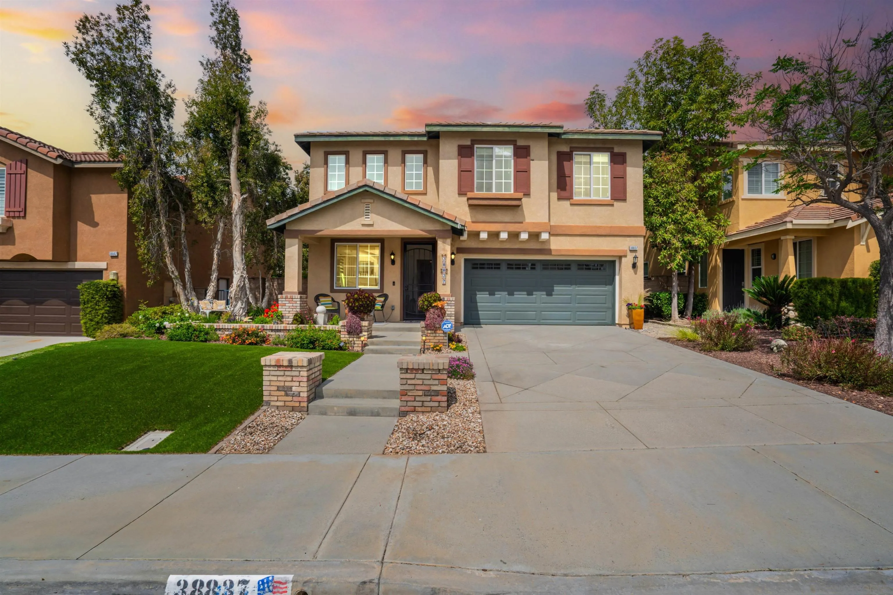 38837 Rockinghorse Road Murrieta, CA 92563 - Photo 2 of 41 a front view of a house with a yard
