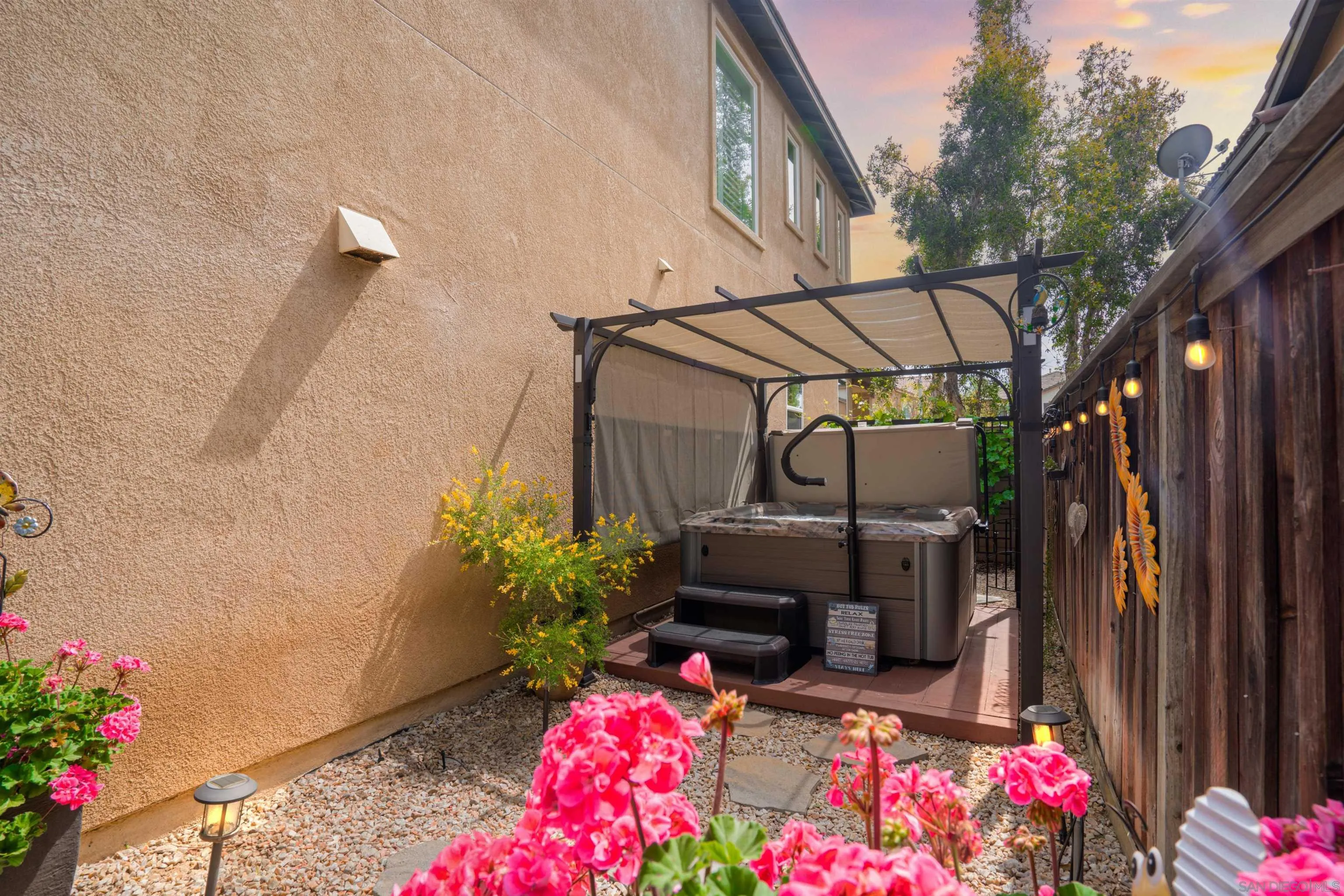 38837 Rockinghorse Road Murrieta, CA 92563 - Photo 33 of 41 a view of patio with a table and chairs and potted plants
