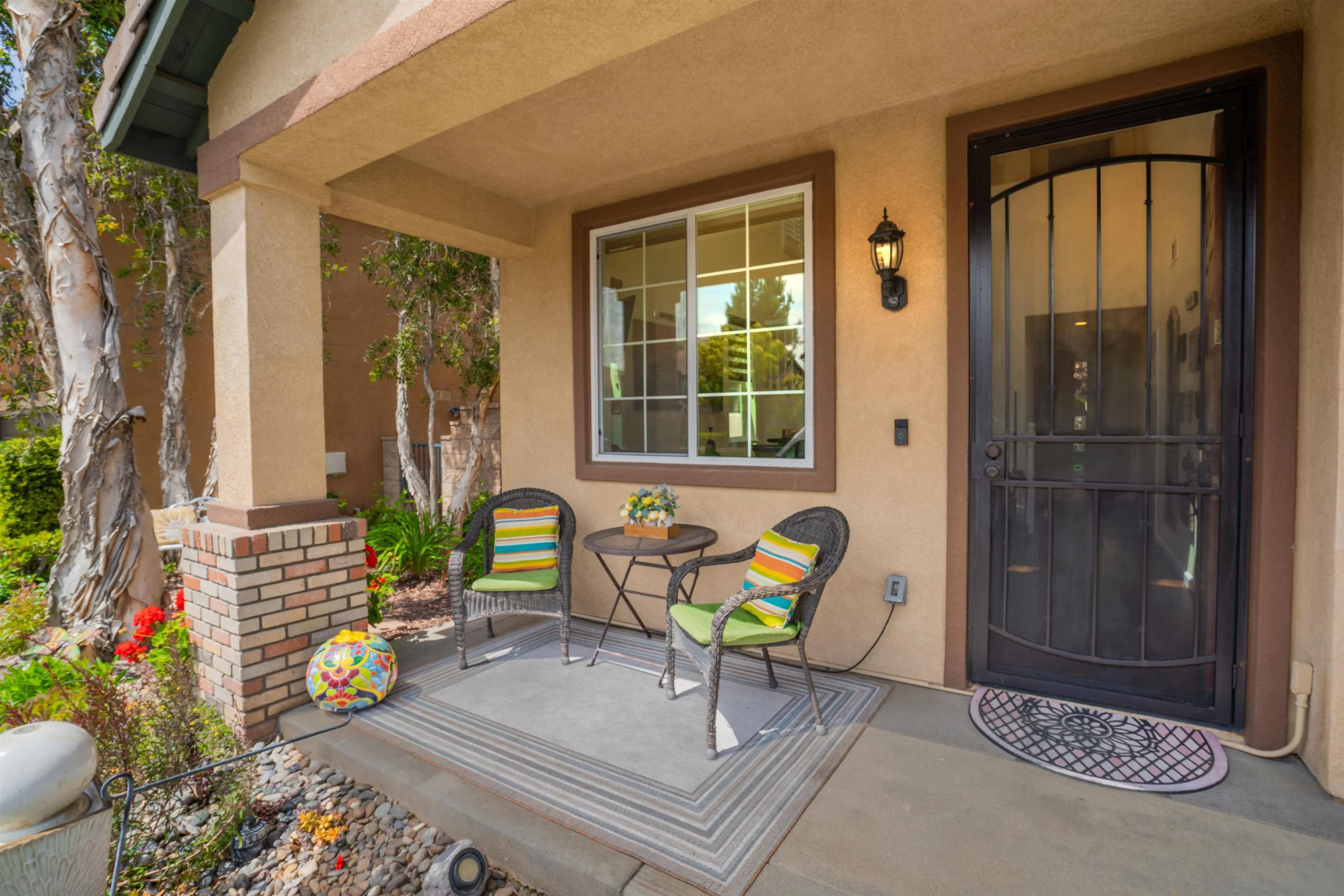 38837 Rockinghorse Road Murrieta, CA 92563 - Photo 4 of 41 a outdoor living space with patio furniture and potted plants