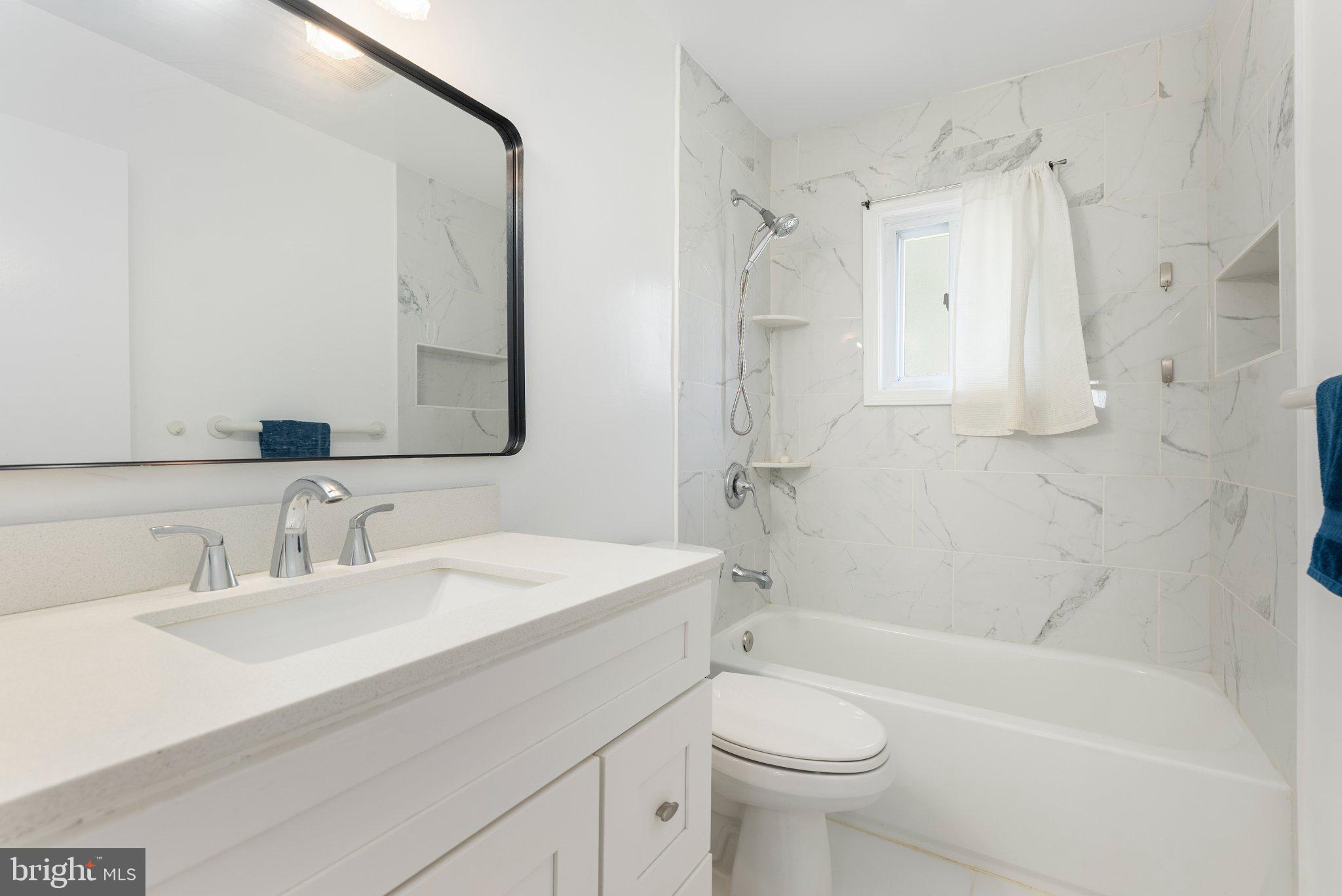 1502 Melton Road Lutherville-Timonium, MD 21093 - Photo 20 of 43 Sleek marble bathroom oasis.