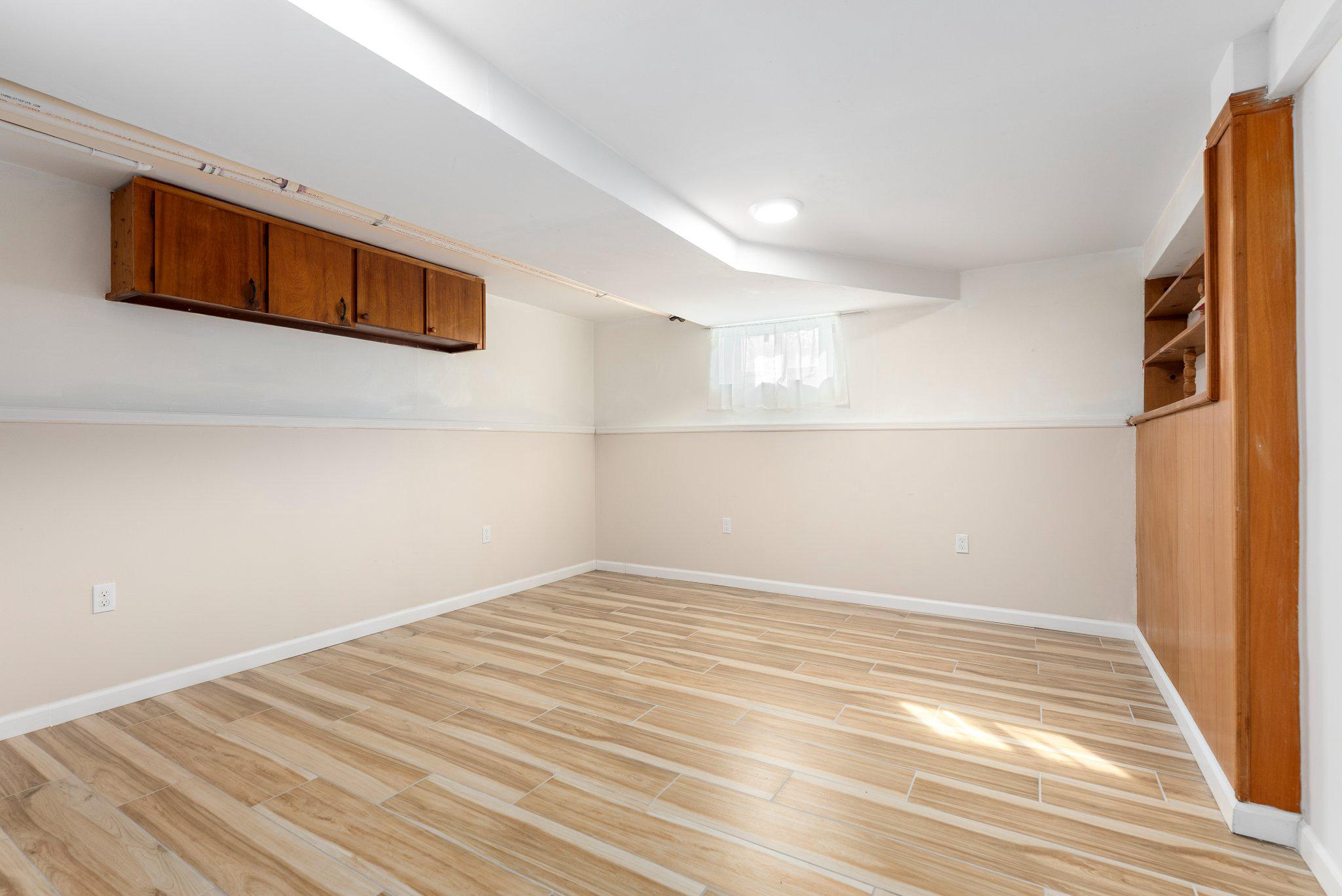 1502 Melton Road Lutherville-Timonium, MD 21093 - Photo 26 of 43 Lower Level Family Room