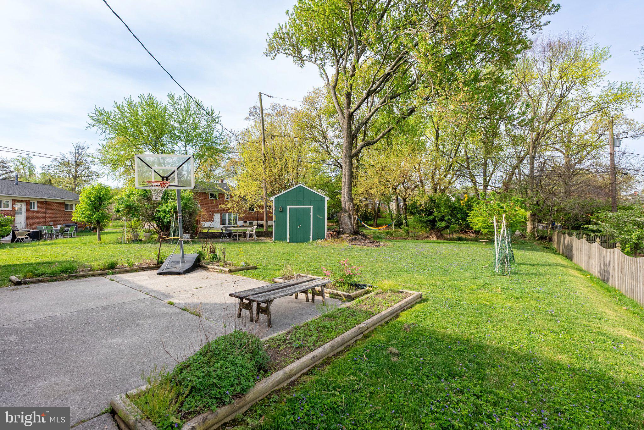 1502 Melton Road Lutherville-Timonium, MD 21093 - Photo 36 of 43 Spacious backyard with lush greenery.