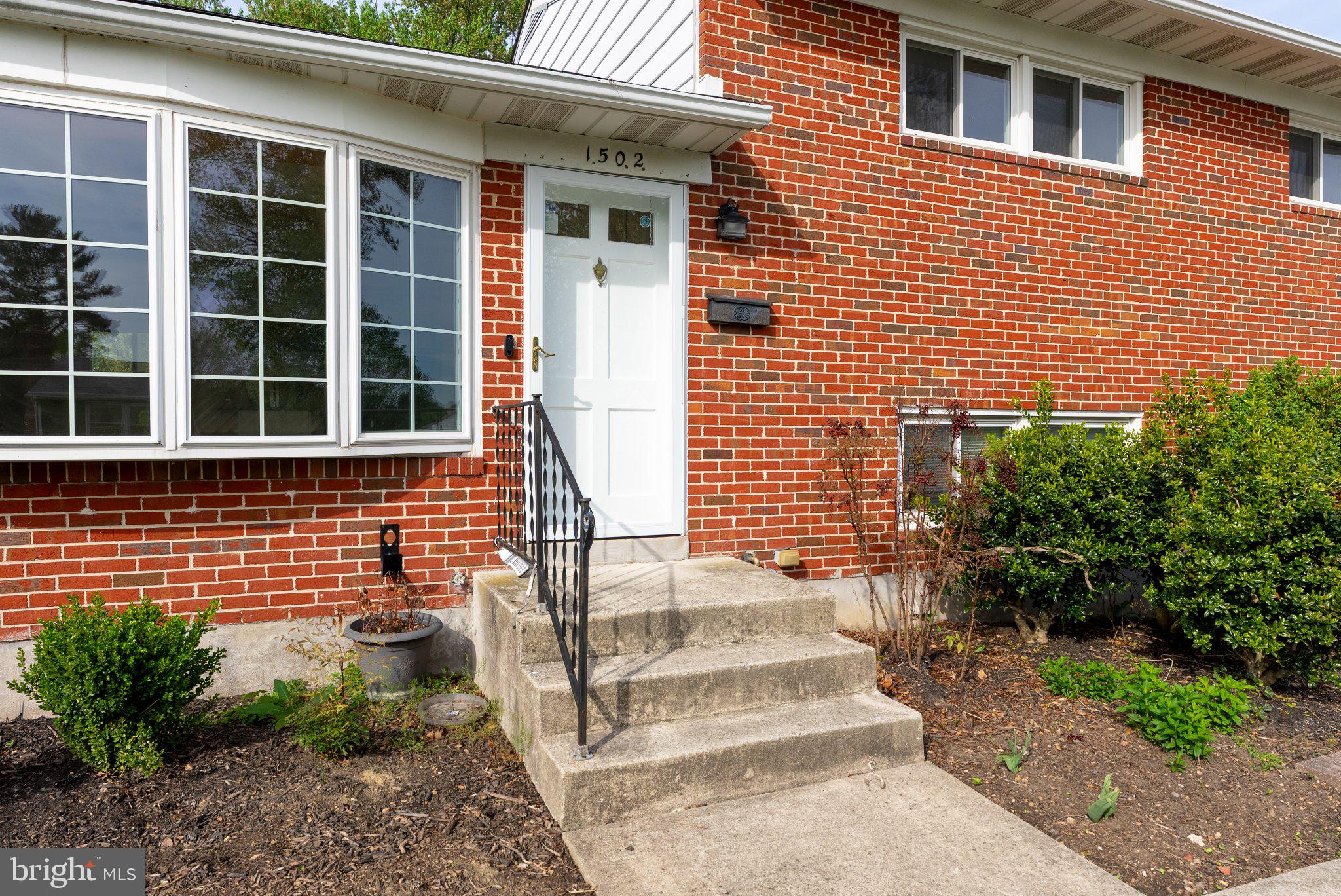 1502 Melton Road Lutherville-Timonium, MD 21093 - Photo 4 of 43 Charming brick facade with inviting entry.
