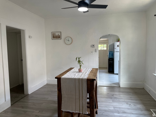 857 27th Street Ogden, UT 84403 - Photo 16 of 20 Interior space with wood-finish flooring and a contemporary black ceiling fan with integrated lighting