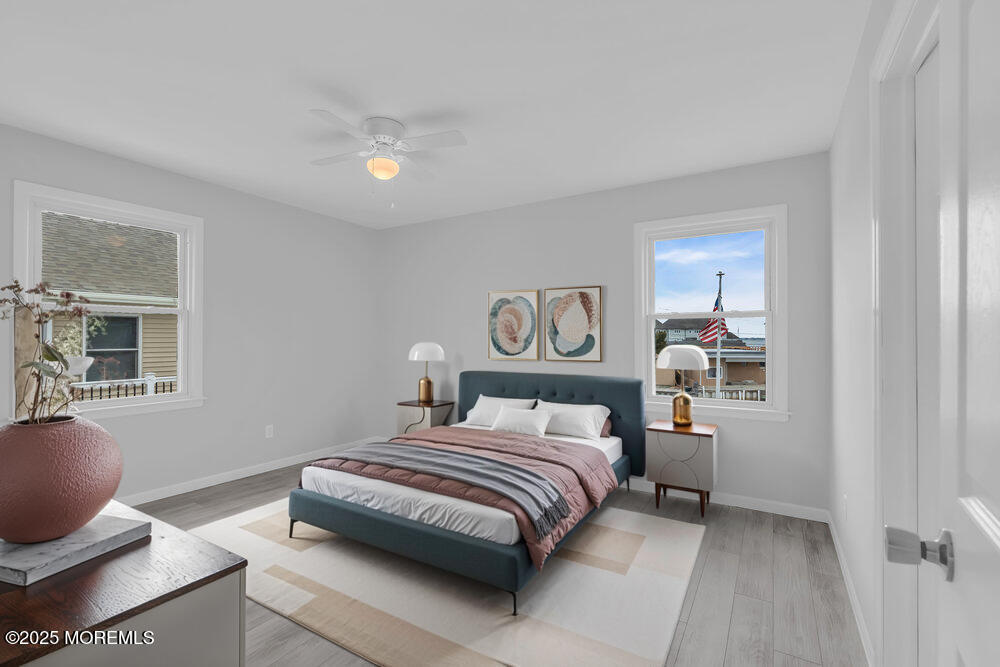 26 Mermaid Road Toms River, NJ 08753 - Photo 25 of 48 a bedroom with a bed and wooden floor