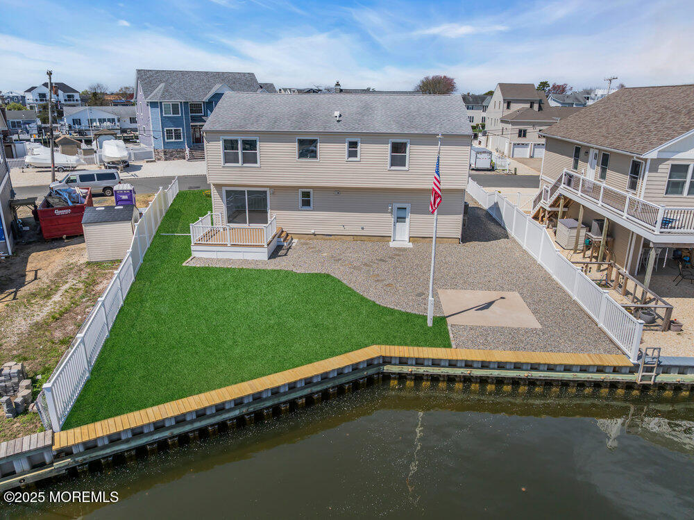 26 Mermaid Road Toms River, NJ 08753 - Photo 38 of 48 a view of a house with a swimming pool