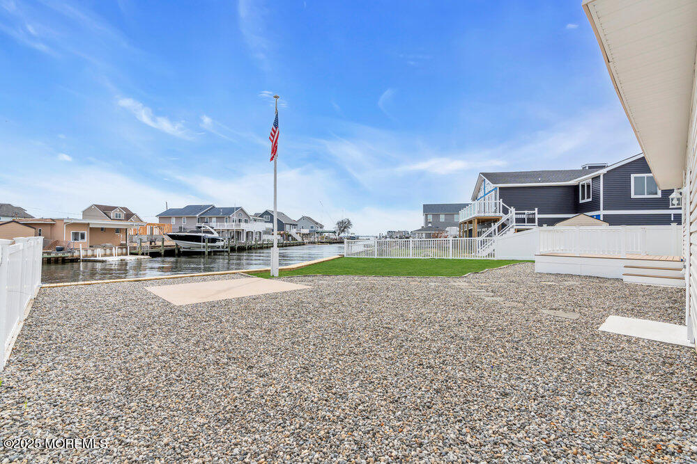 26 Mermaid Road Toms River, NJ 08753 - Photo 39 of 48 a view of a house with a swimming pool