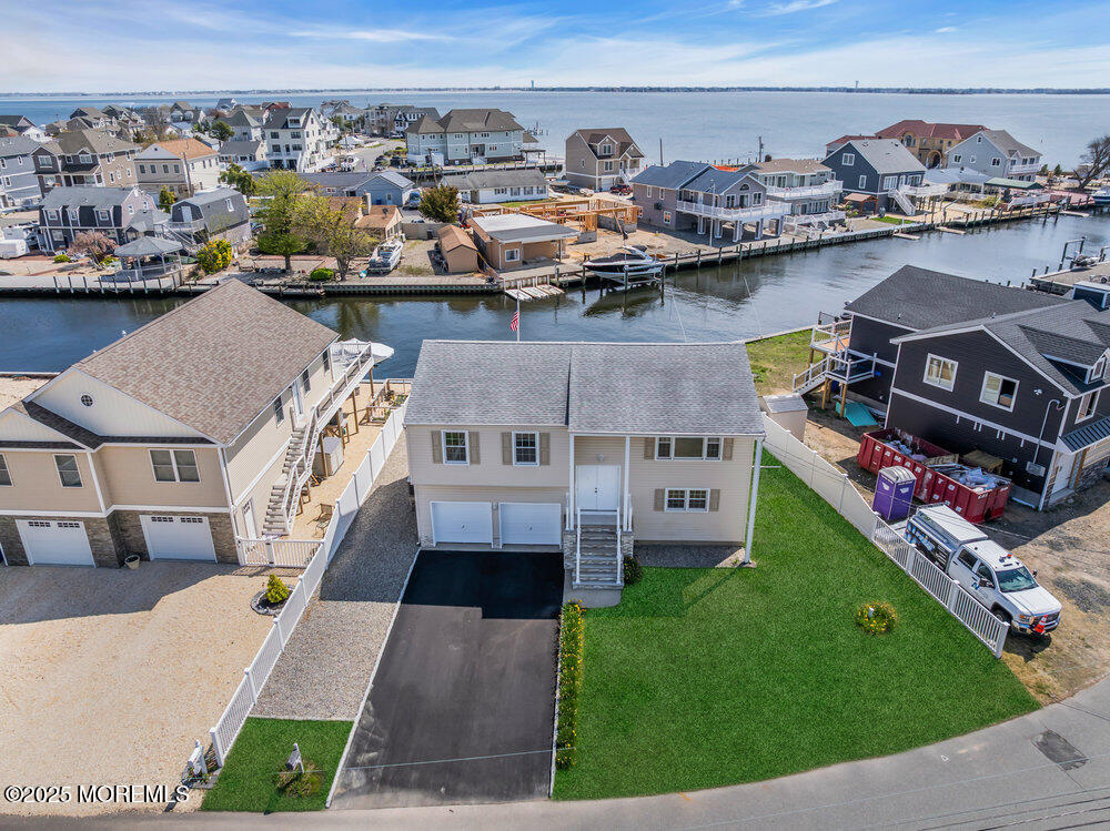 26 Mermaid Road Toms River, NJ 08753 - Photo 42 of 48 a aerial view of multiple houses with a yard