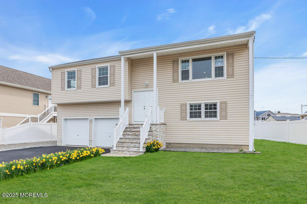 26 Mermaid Road Toms River, NJ 08753 - Photo 8 of 48 a view of a house with a backyard