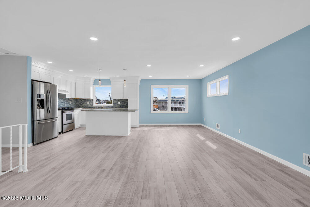26 Mermaid Road Toms River, NJ 08753 - Photo 10 of 48 a view of kitchen with wooden floor and electronic appliances