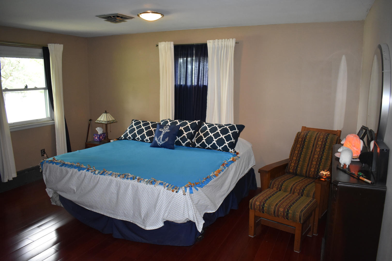 302 Weaver Court Loda, IL 60948 - Photo 12 of 25 a bed sitting in a bedroom next to a window
