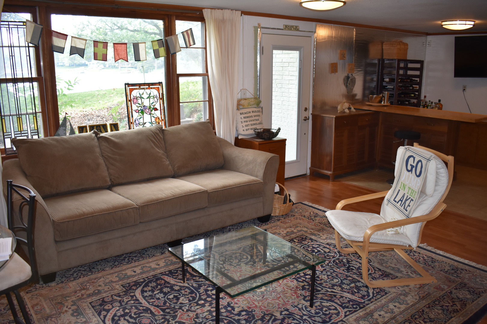 302 Weaver Court Loda, IL 60948 - Photo 21 of 25 a living room with furniture and a large window
