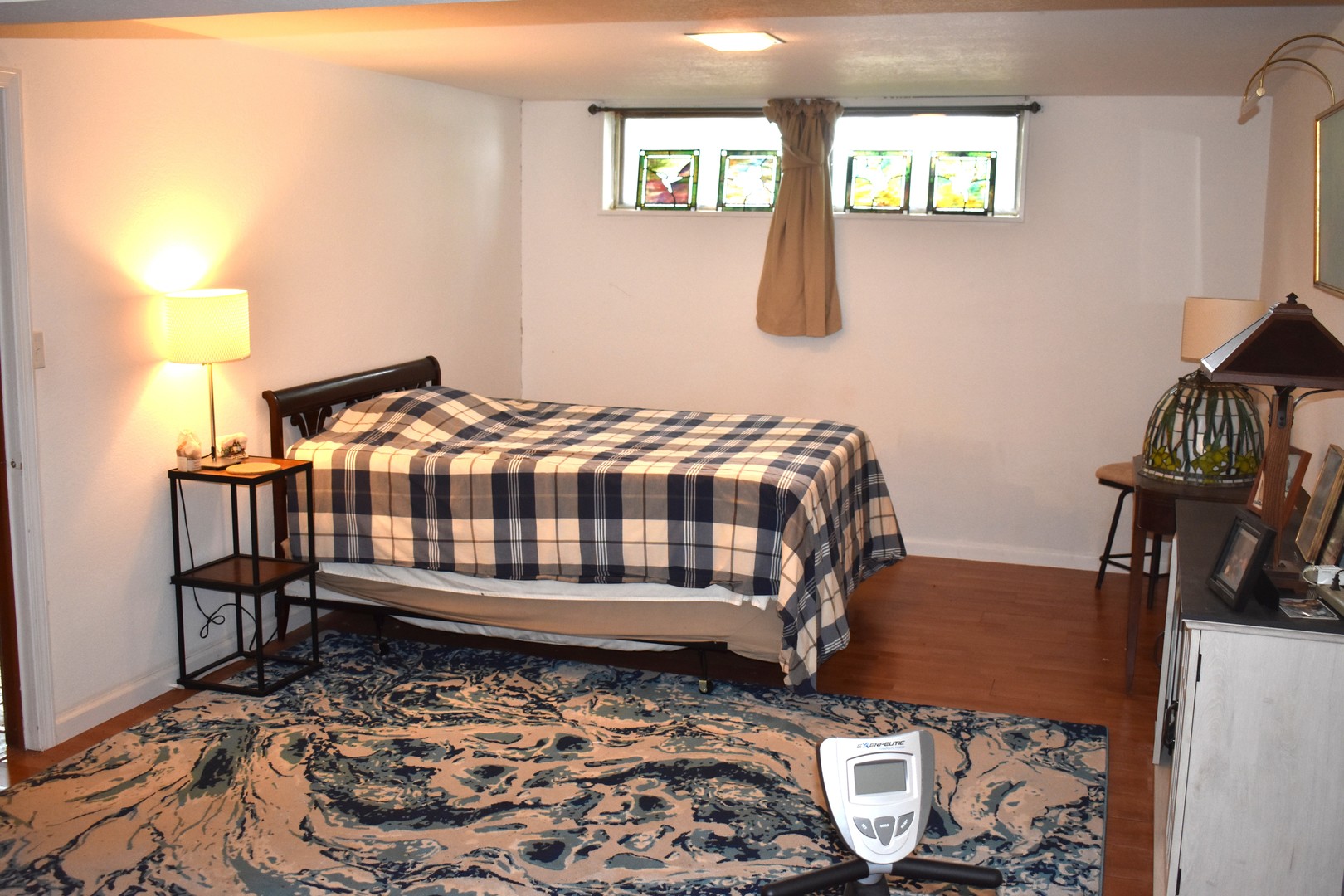 302 Weaver Court Loda, IL 60948 - Photo 24 of 25 a bedroom with a bed and wooden floor