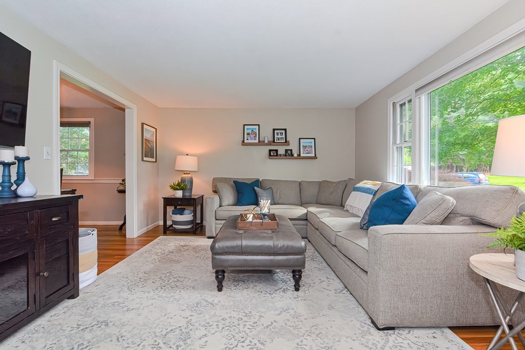 2 Meadowbrook Road Acton, MA 01720 - Photo 2 of 36 a living room with furniture and a couch
