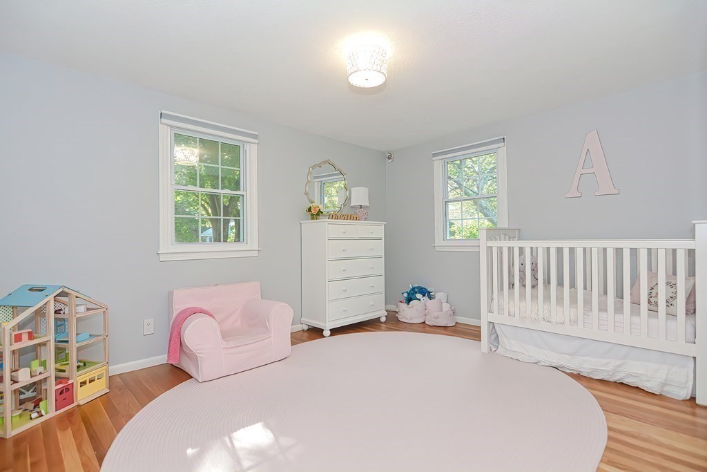 2 Meadowbrook Road Acton, MA 01720 - Photo 26 of 36 a bedroom with a bed and a window