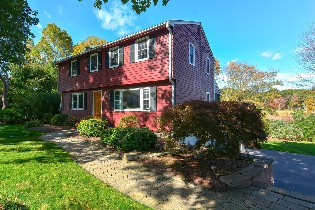 2 Meadowbrook Road Acton, MA 01720 - Photo 29 of 36 a front view of a house with a yard