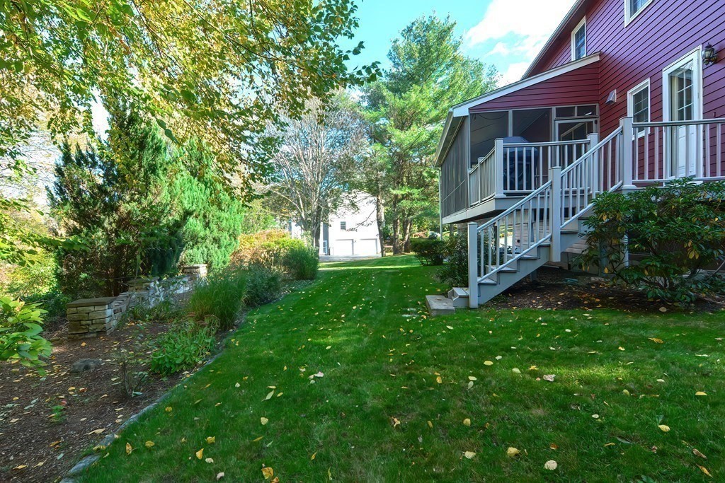 2 Meadowbrook Road Acton, MA 01720 - Photo 30 of 36 a view of backyard with deck and garden