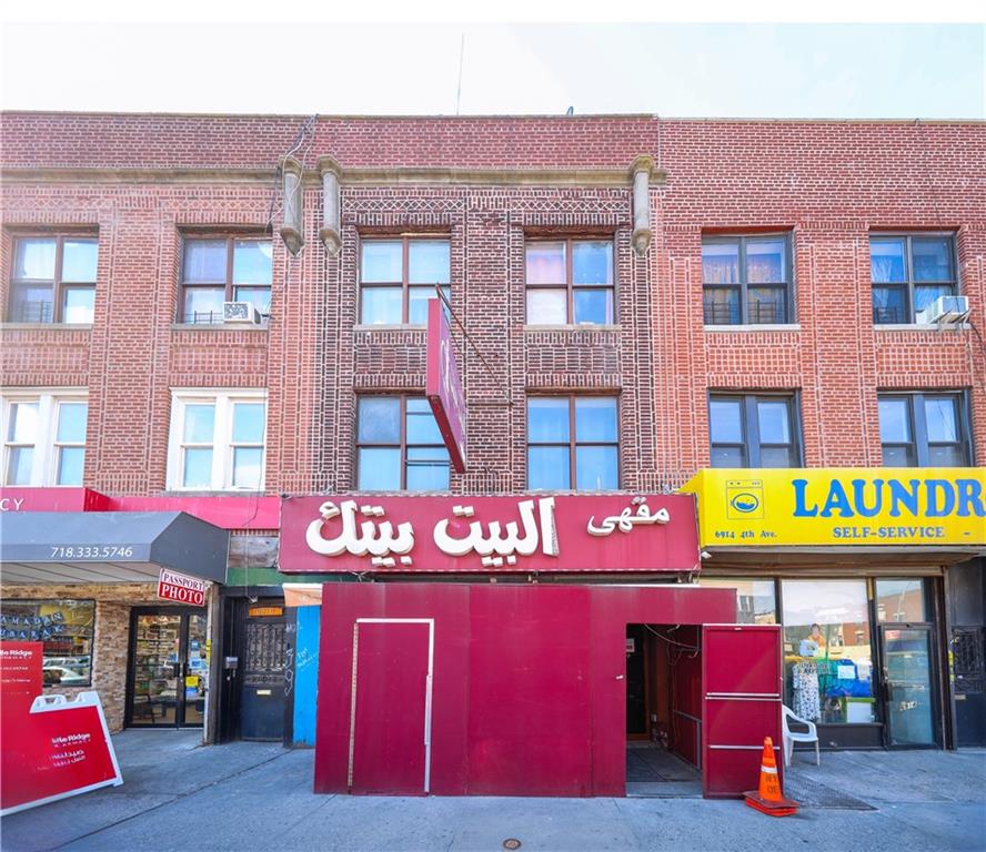 a cafe on red top of building