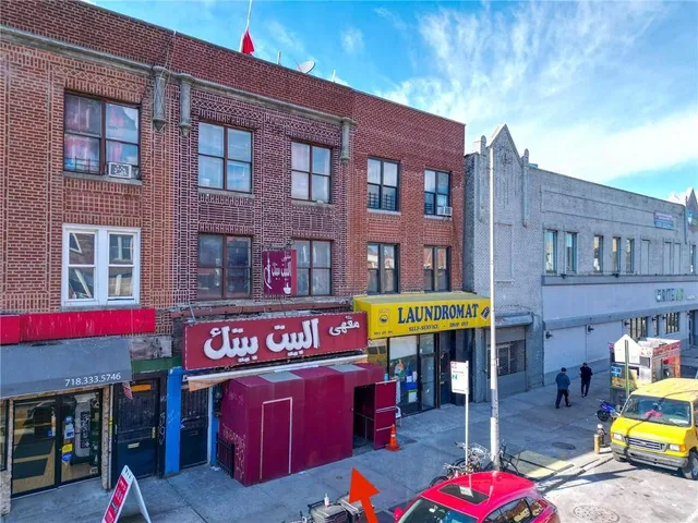 a building on the side of a street