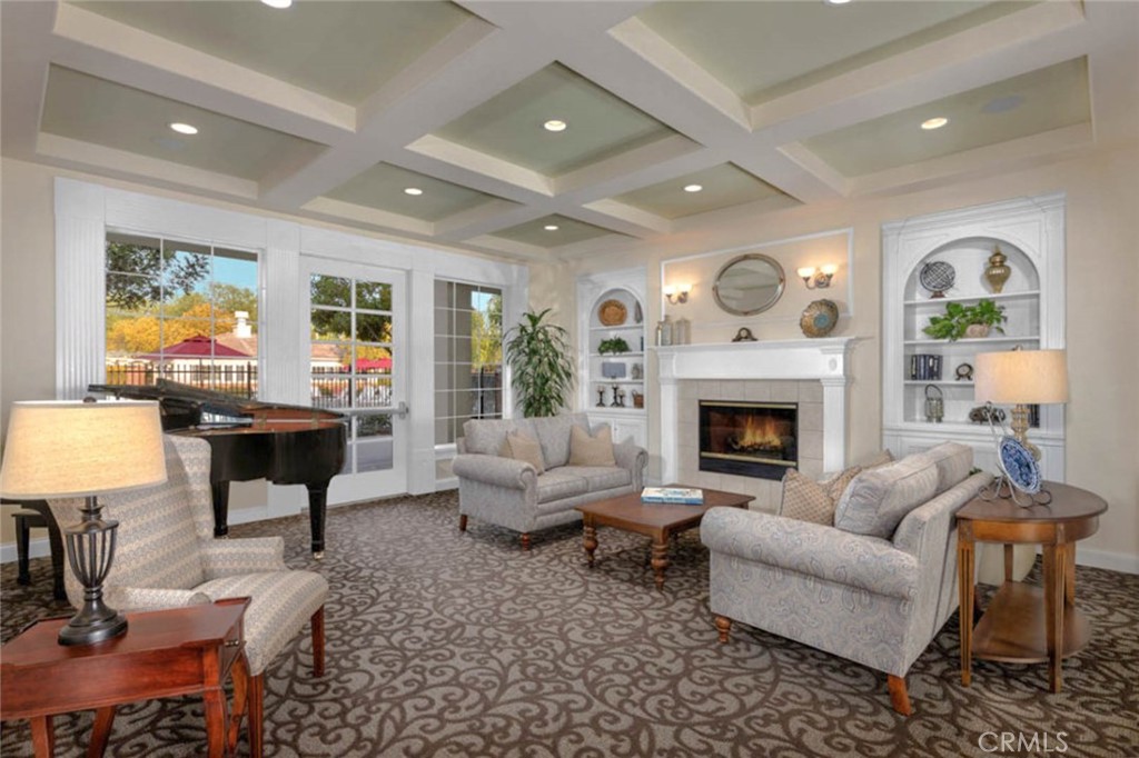 8150 West Preserve Loop Chino, CA 91708 - Photo 45 of 51 a living room with furniture and a fireplace