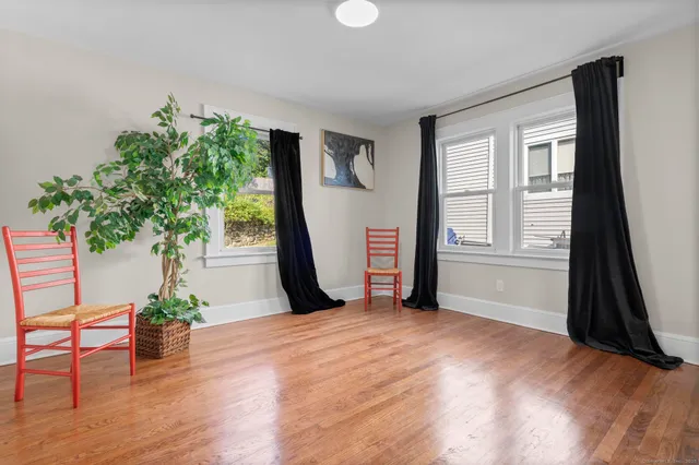 a view of a livingroom with a potted plant