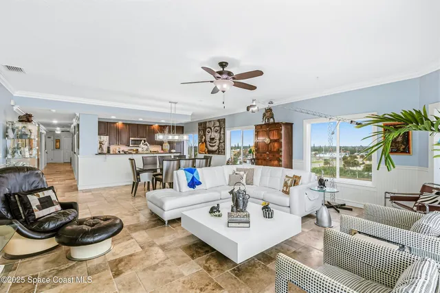 a view of a glass door with a tree in front of it