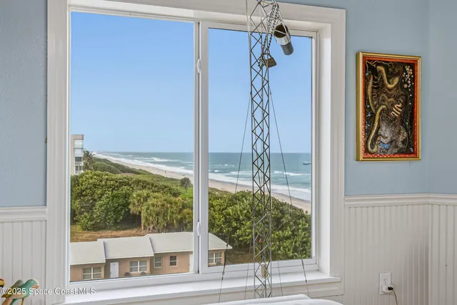 a living room with furniture a dining table and kitchen view