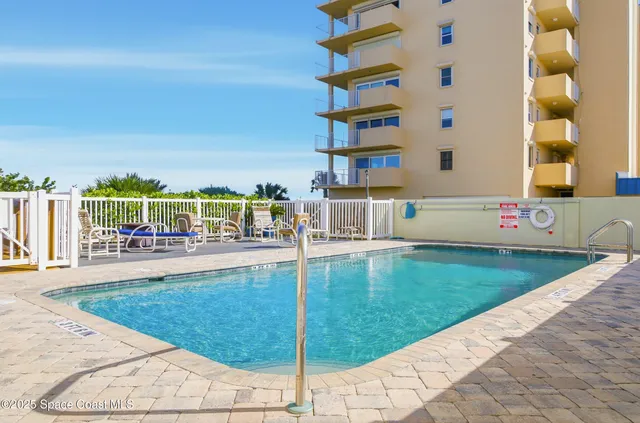 a view of a livingroom with a staircase