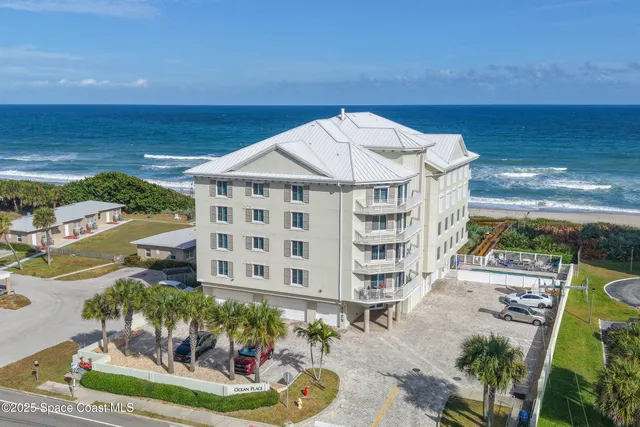 a view of a livingroom with furniture and a flat screen tv