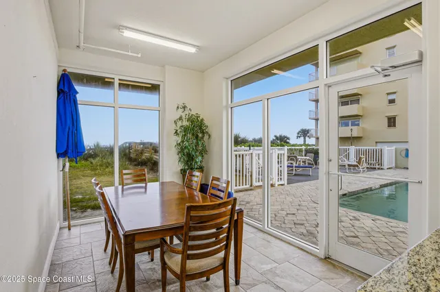 a view of a street with an ocean view