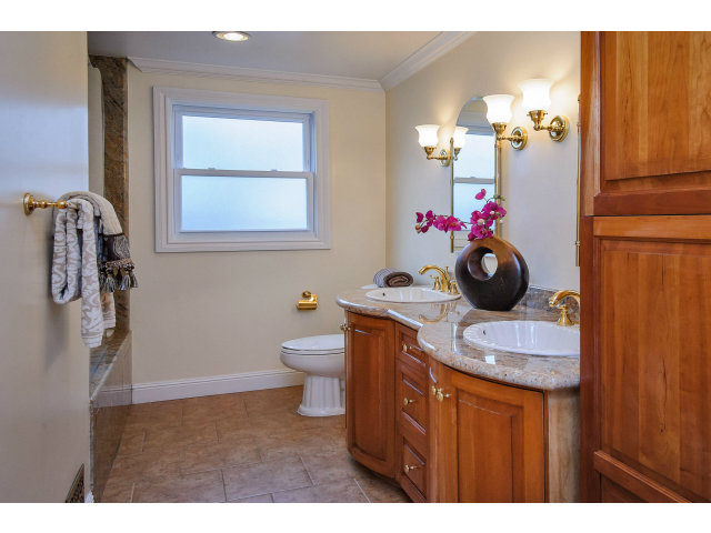 512 Princeton Road San Mateo, CA 94402 - Photo 11 of 13 a bathroom with a sink toilet and shower