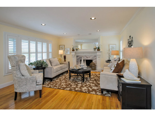 512 Princeton Road San Mateo, CA 94402 - Photo 2 of 13 a living room with furniture and a fireplace