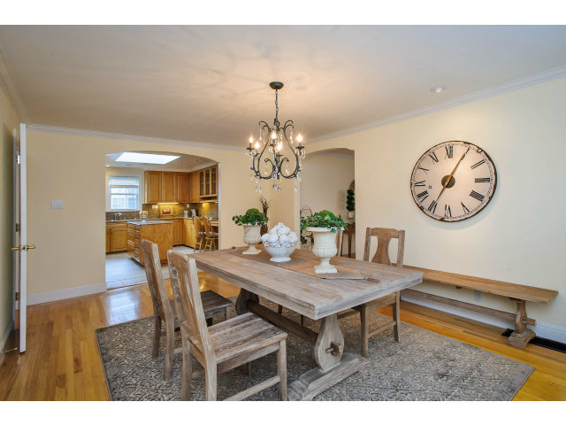 512 Princeton Road San Mateo, CA 94402 - Photo 5 of 13 a view of a dining room with furniture and a chandelier