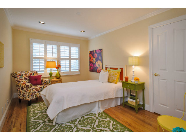 512 Princeton Road San Mateo, CA 94402 - Photo 9 of 13 a bedroom with a bed and wooden floor