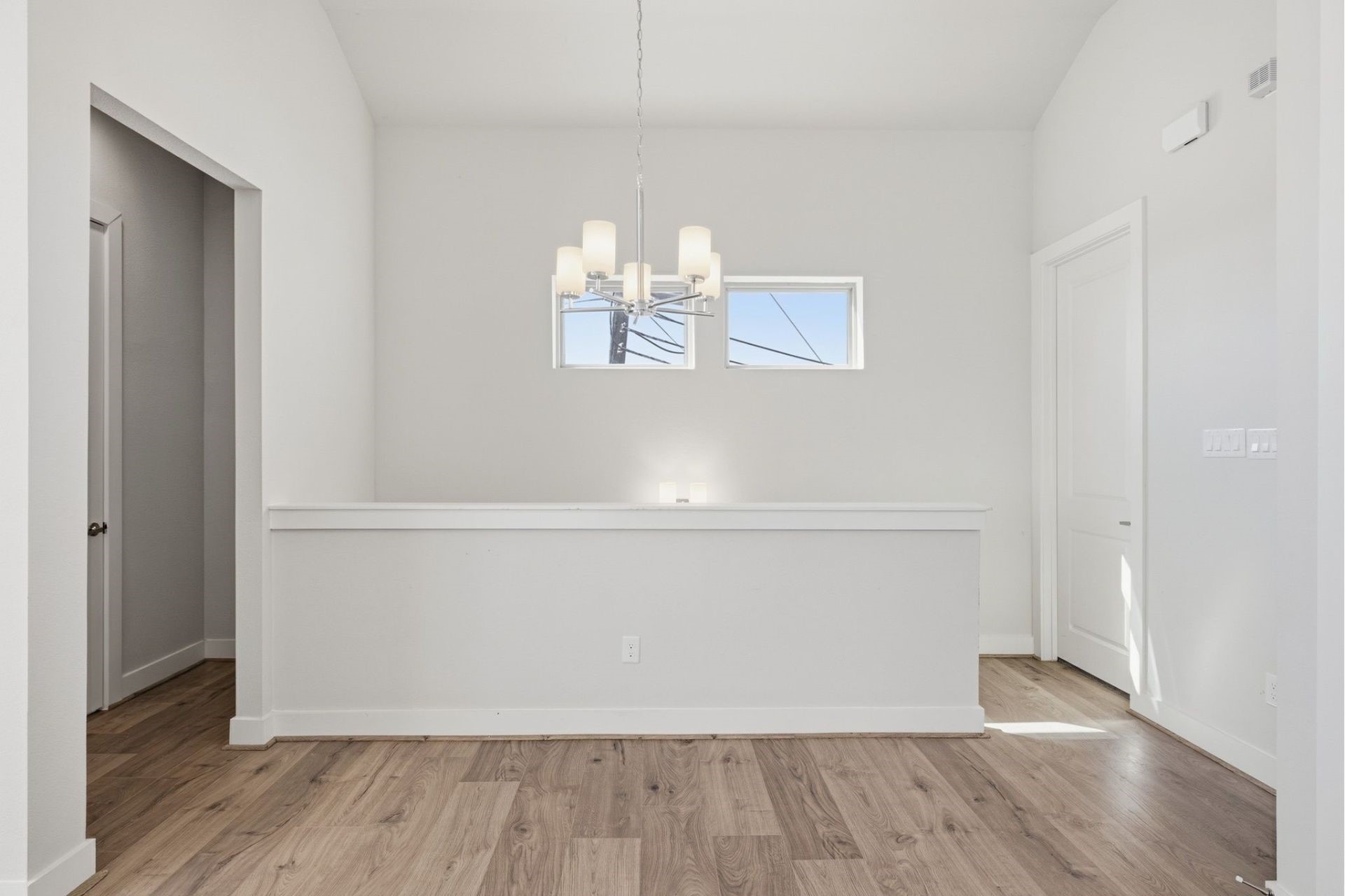 2948 Alice Street Houston, TX 77054 - Photo 12 of 24 a view of an empty room with wooden floor