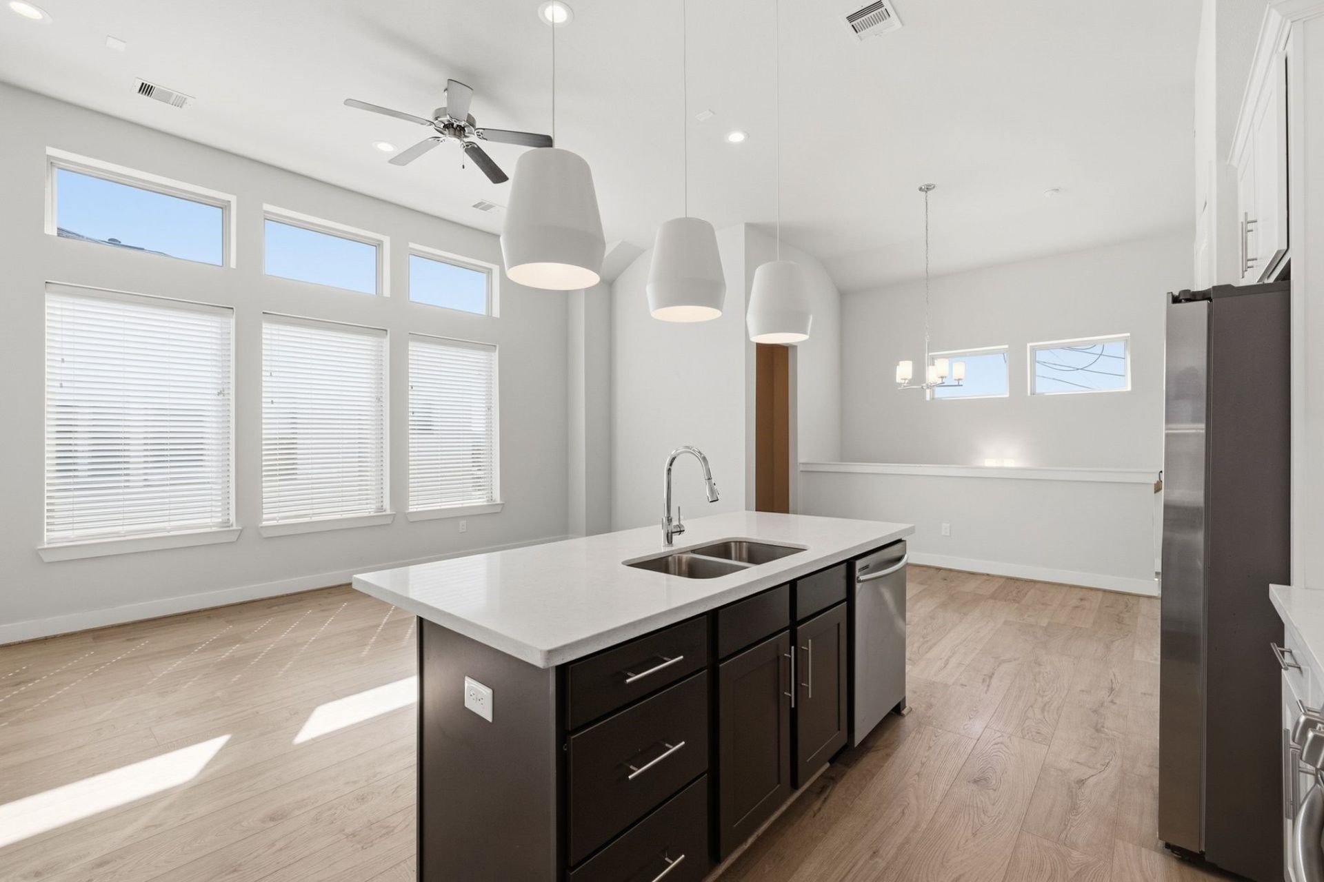 2948 Alice Street Houston, TX 77054 - Photo 9 of 24 a kitchen with a stove a sink a refrigerator and a window